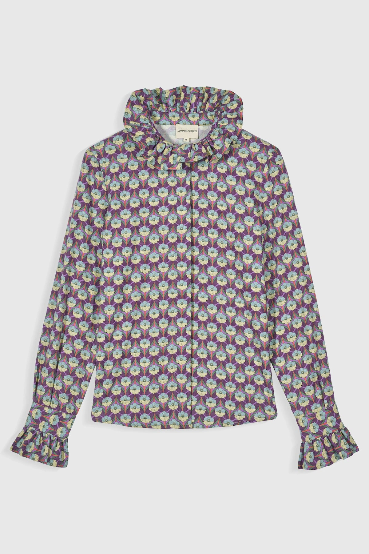 Bisou Blouse: A touch of French chic, guaranteed to turn heads and steal hearts this season.